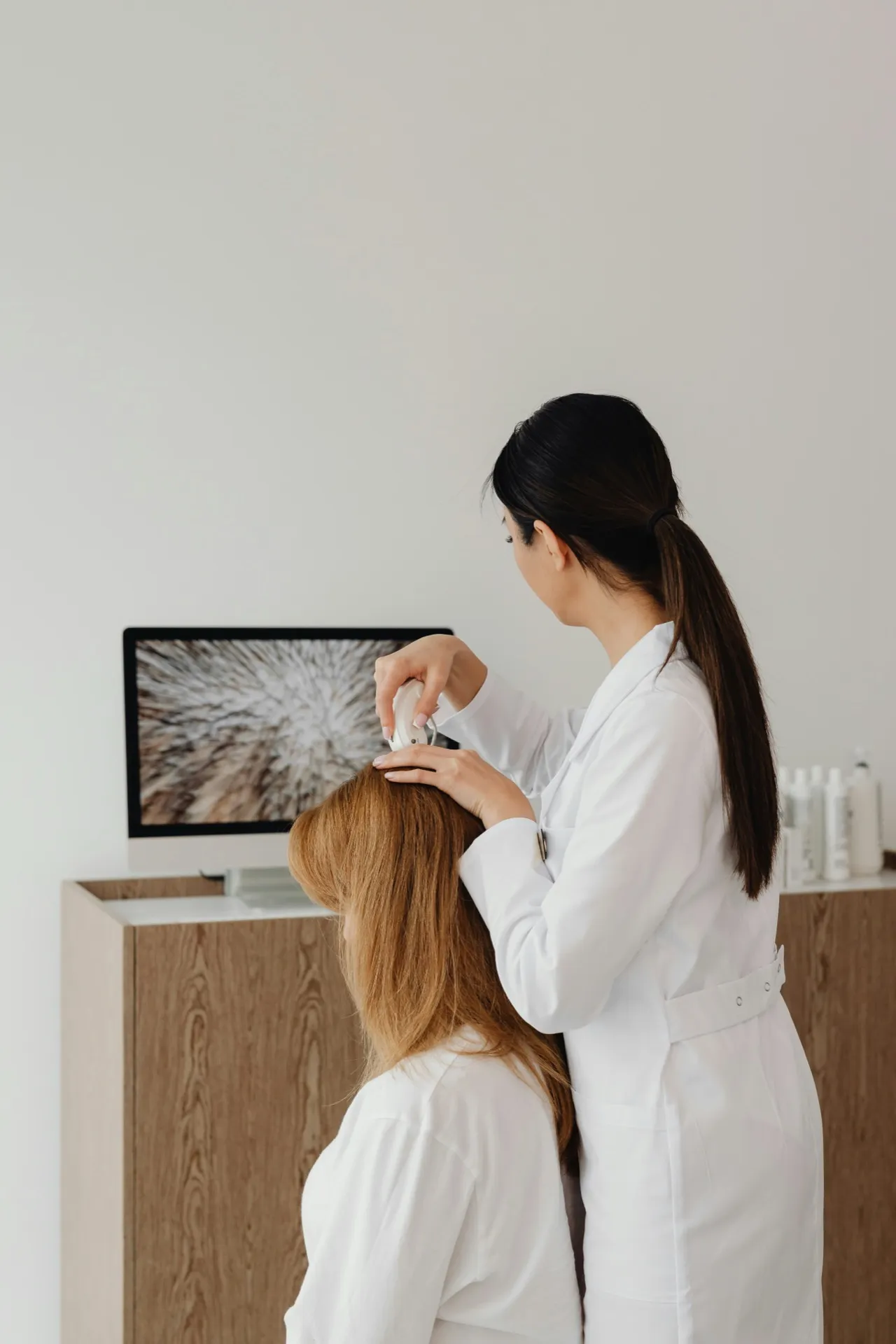 Patient with restored, fuller hair after regenerative treatment